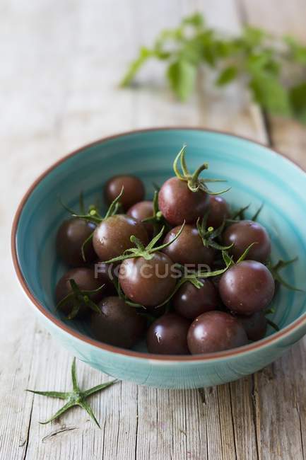 Cherry tomatoes in bowl — Stock Photo