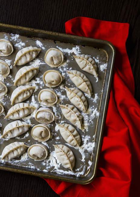 Fresh uncooked handmade Chinese dumplings — Stock Photo