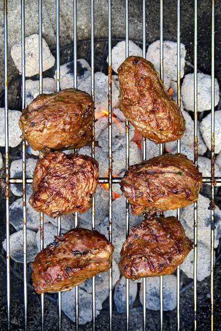 Lamb point steaks on barbecue — Stock Photo