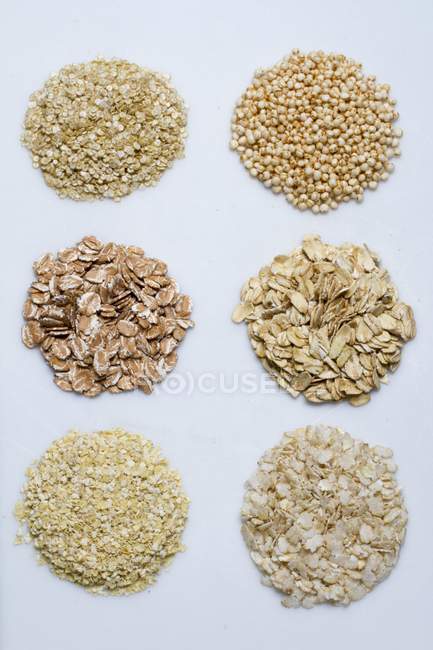 Six piles of various grains — Stock Photo