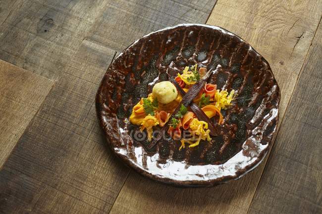 Variations on carrots on plate — Stock Photo