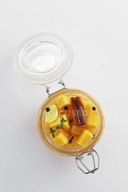 Pumpkin with spices in jar — Stock Photo