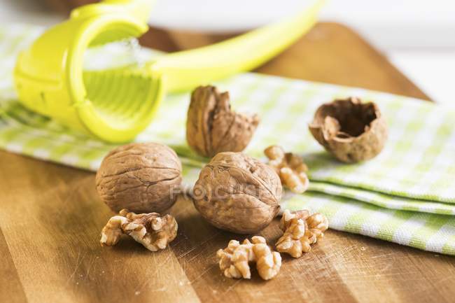 Walnuts with Nut Crackers — Stock Photo