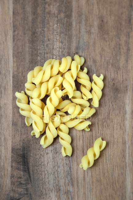 Dry uncooked maxi fusilli pasta — Stock Photo