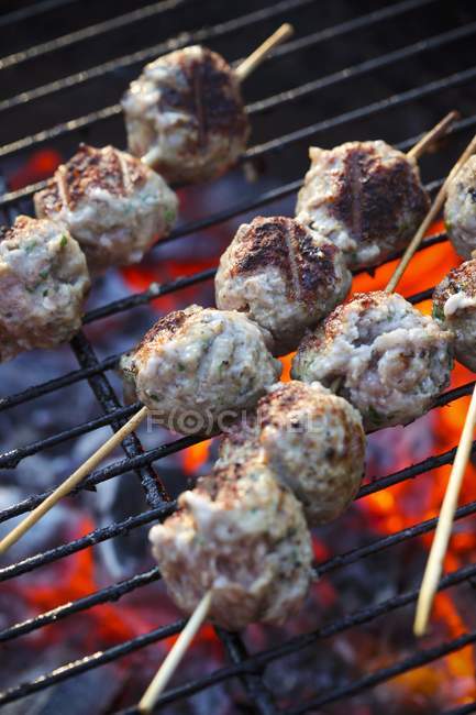 Fried meatballs with sicks — Stock Photo