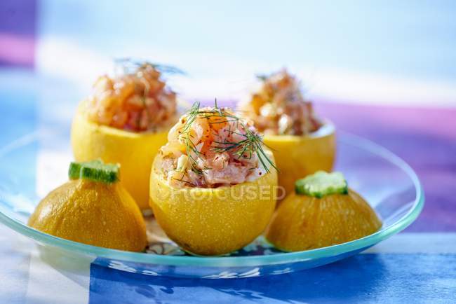 Yellow courgette with salmon filling — Stock Photo