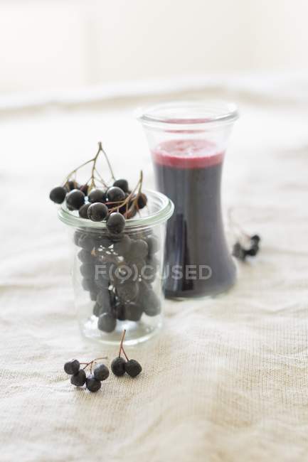 Fresh aronia berries — Stock Photo