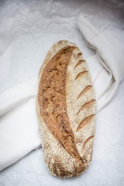 Sourdough bread on white — Stock Photo