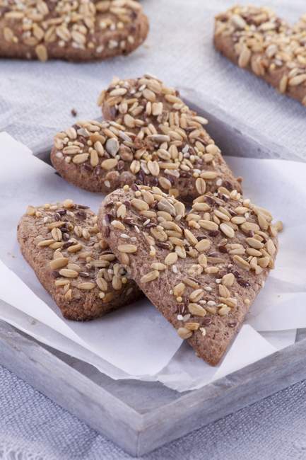 Wholemeal biscuits with seeds — Stock Photo