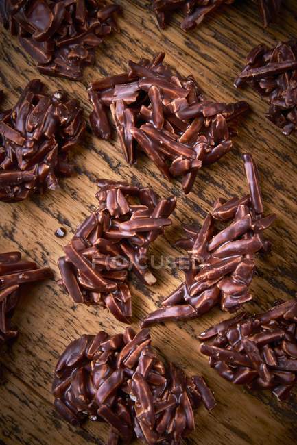 Slivered almonds in chocolate — Stock Photo