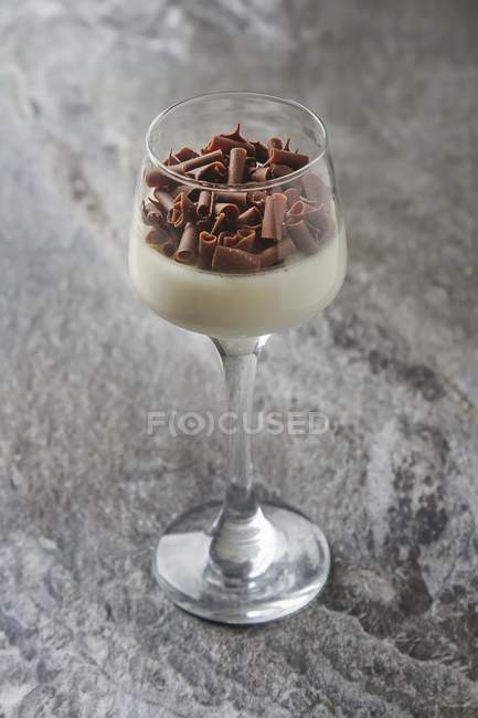 Panna cotta with curls — Stock Photo