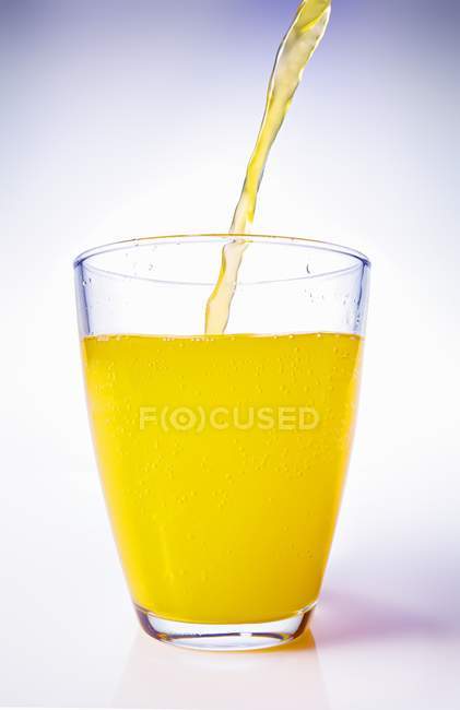 Orange Juice Pouring — Stock Photo