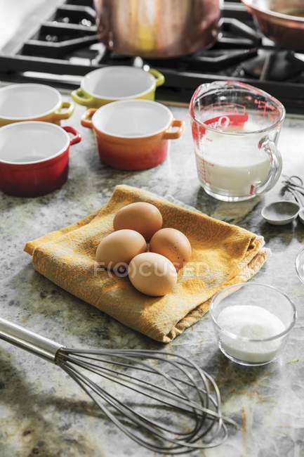Eggs milk and sugar — Stock Photo