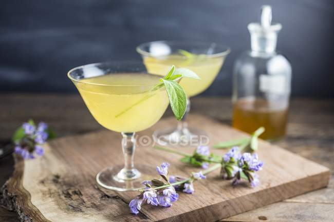 Cocktails with sage in glasses — Stock Photo