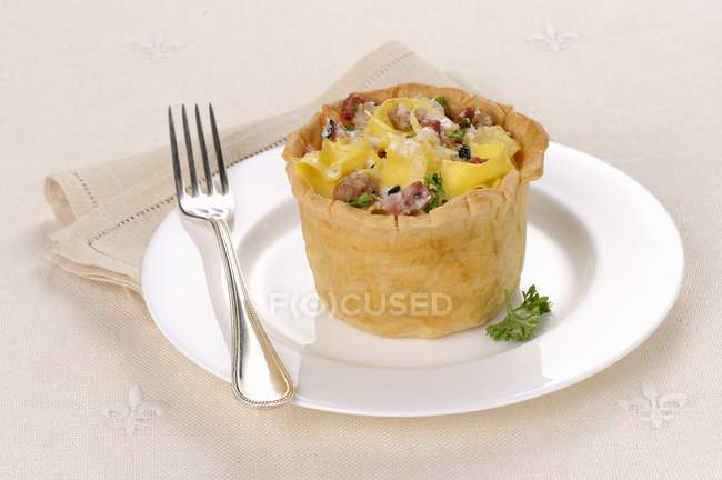 Pappardelle pasta in dough case — Stock Photo