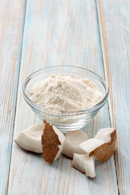 Coconut flour in bowl — Stock Photo