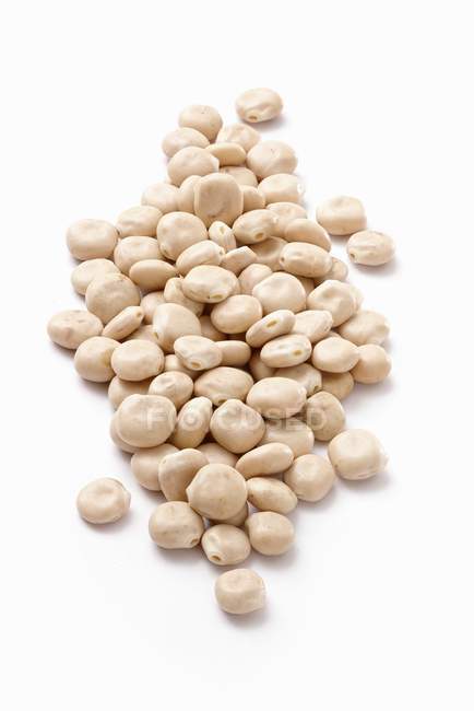 Lupin seeds on white background — Stock Photo