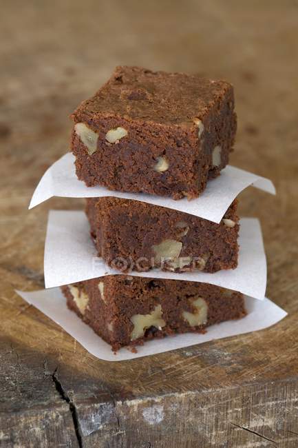 Stack of fresh baked nut brownies — Stock Photo