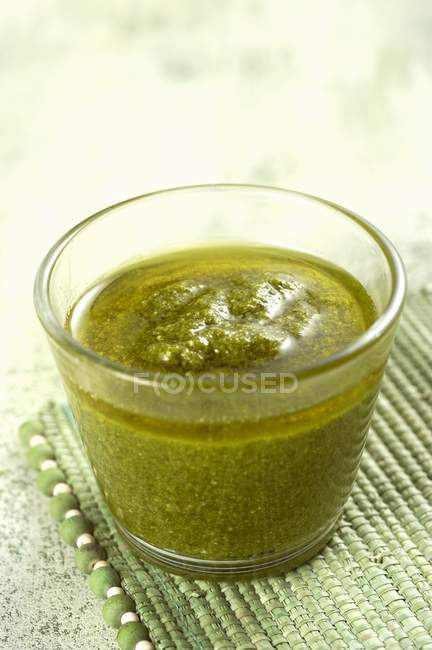 Closeup view of a jug of Salsa Verde — Stock Photo