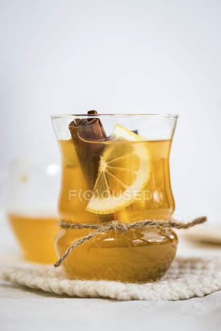 Cider with a cinnamon stick — Stock Photo