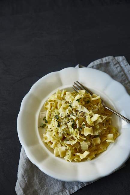 Krautfleckerln dish of pasta and cabbage — Stock Photo