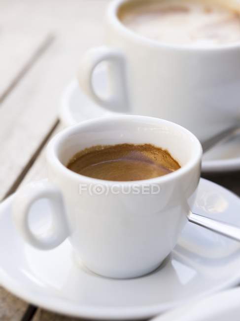 Breakfast espresso in white cup — Stock Photo