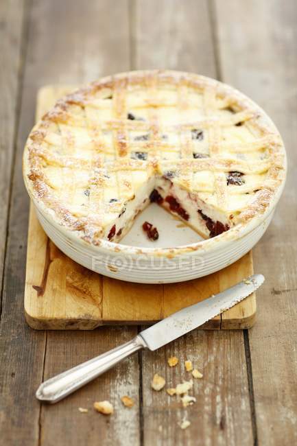 Cheesecake with lingonberries in bowl — Stock Photo