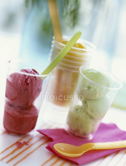Cups with fruit sorbets — Stock Photo