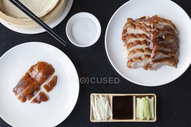 Slices of crispy Peking duck — Stock Photo