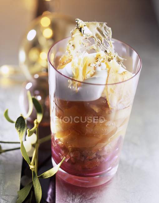 Nectarines and biscuits in glass — Stock Photo