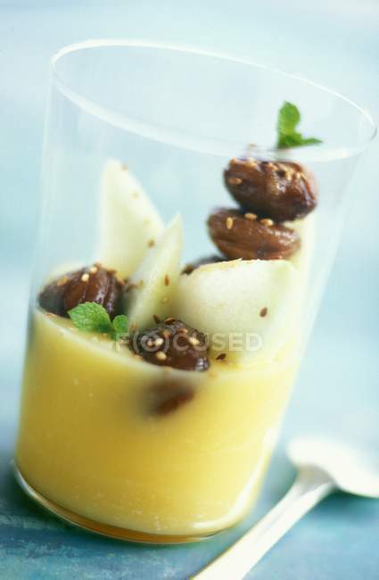 Closeup view of poached pears with chestnuts — Stock Photo