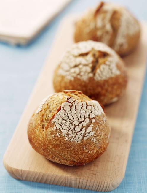 Balls of bread on desk — Stock Photo