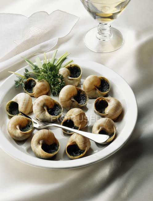 Snails from Bourgogne with butter — Stock Photo
