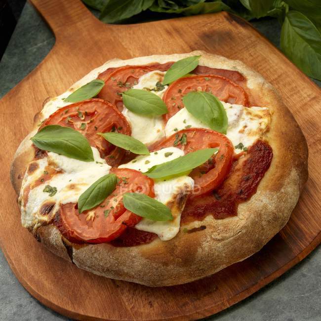 Rustic Pizza with tomatoes — Stock Photo