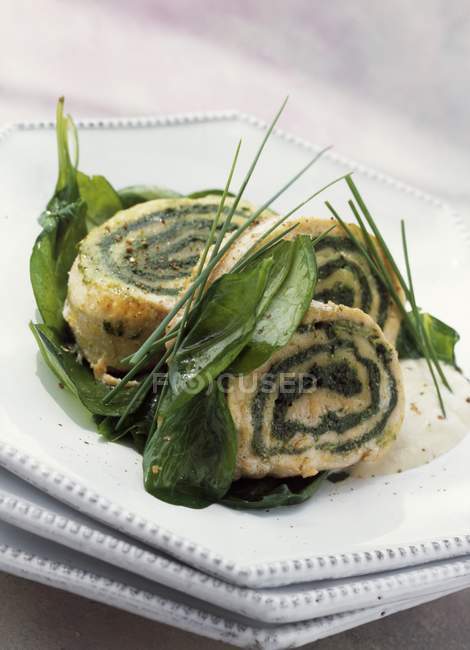 Salmon and roquefort sliced roll — Stock Photo