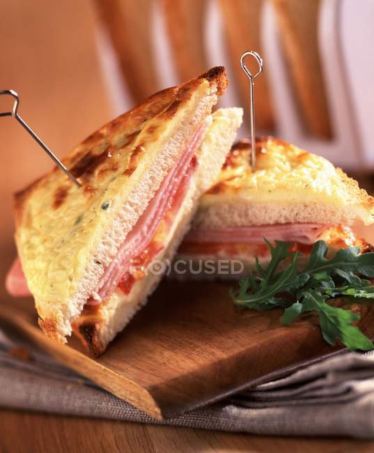 Toasted sandwich on desk — Stock Photo