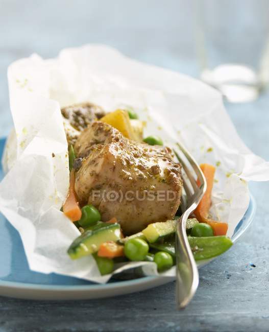 Rabbit with coriander in paper — Stock Photo