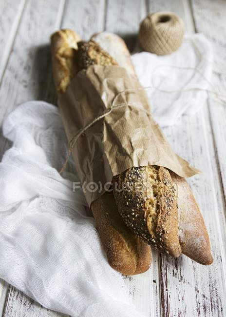 Baguettes wrapped in parchment — Stock Photo