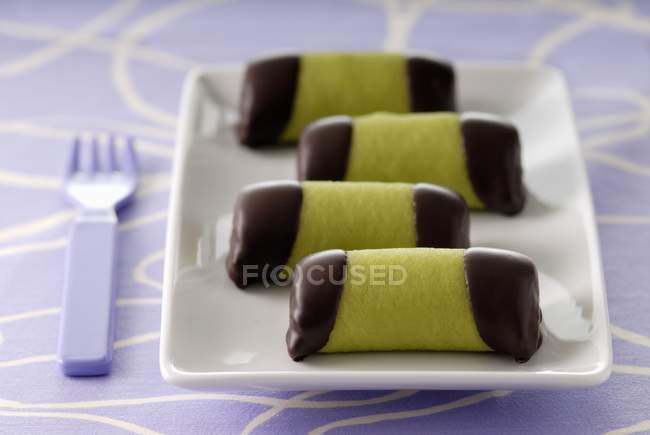 Closeup view of Swedish Punch rolls on plate — Stock Photo