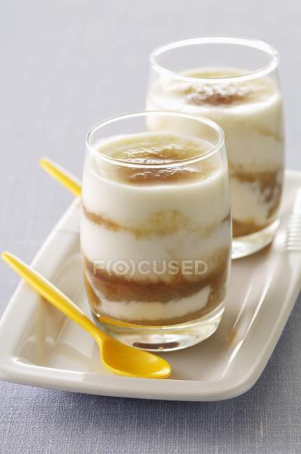 Yogurts with brown sugar — Stock Photo