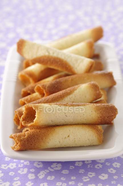 Rolled biscuits on plate — Stock Photo