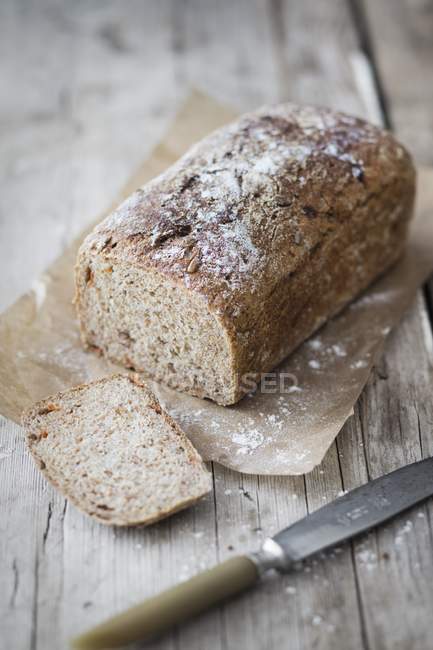 Rye bread on paper — Stock Photo