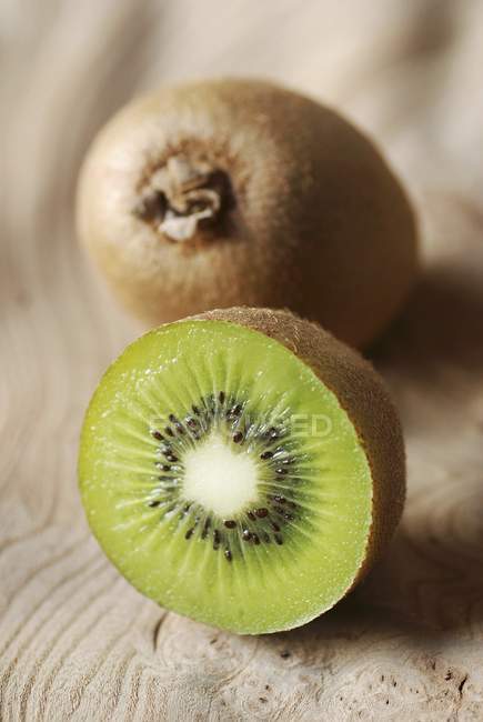 Fresh Kiwi with half — Stock Photo