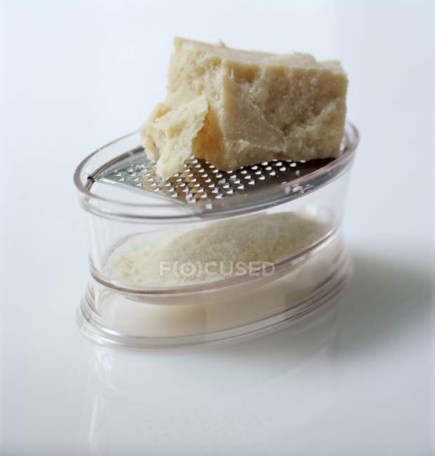 Parmesan in glass bowl — Stock Photo