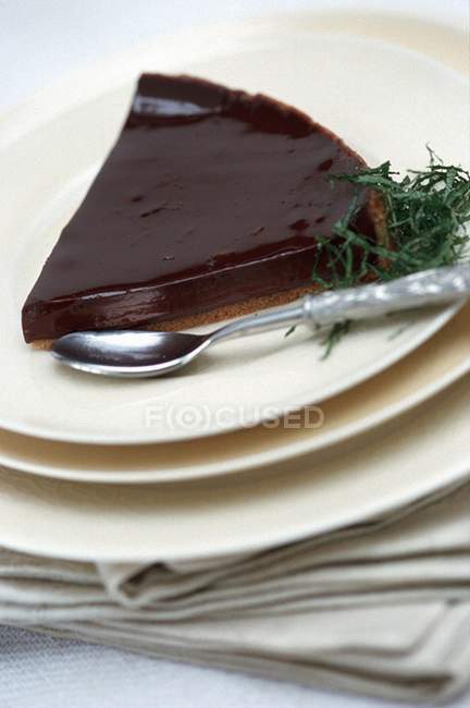 Slice of cream chocolate tart — Stock Photo