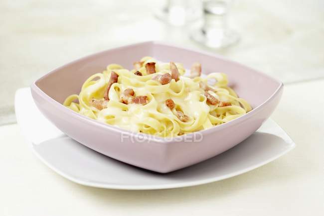 Tagliatelle carbonara pasta with bacon — Stock Photo