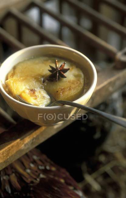 Closeup view of gratinated cream with star anise — Stock Photo