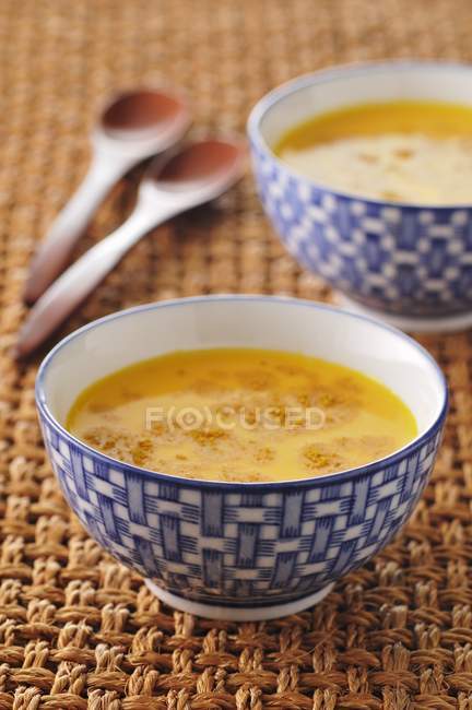 Cream of carrot in bowls — Stock Photo
