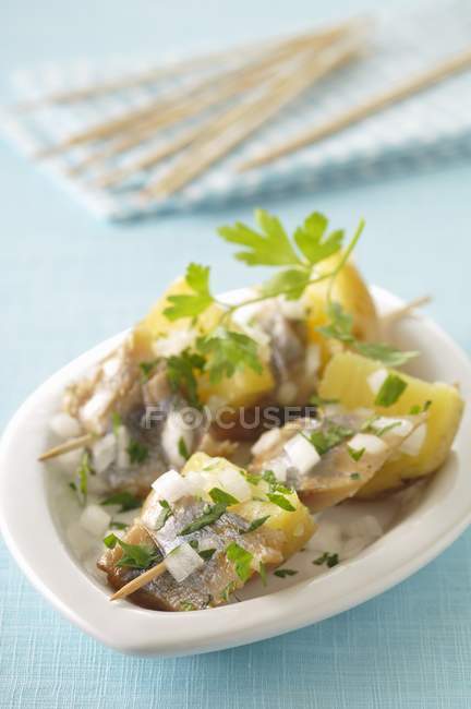 Potatoes marinated in oil — Stock Photo