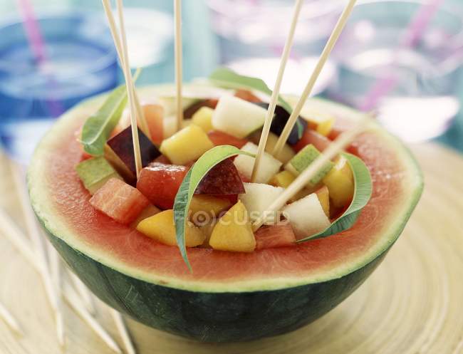 Fruit salad in watermelon — Stock Photo